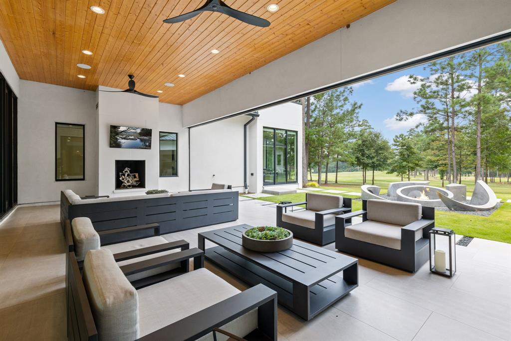 Smart Home technology includes a Savant system, Minka Aire fans and Western Systems sliding glass doors.