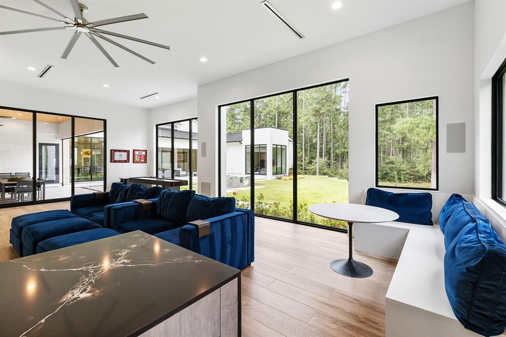 Sliding doors allow generous natural light and more of the home's exceptional views.