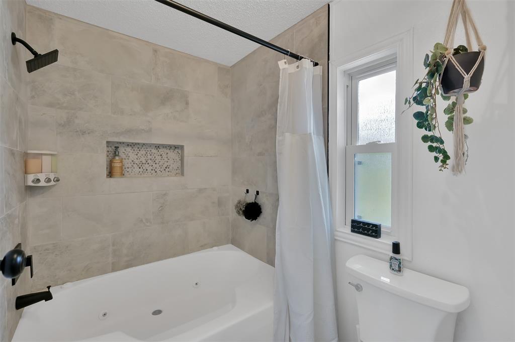 Primary bathroom, jetted soaking tub and shower combo