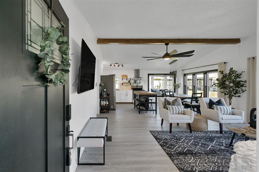 Welcome in to the spacious open concept living, dining and kitchen space over looking the spectacular lake views!