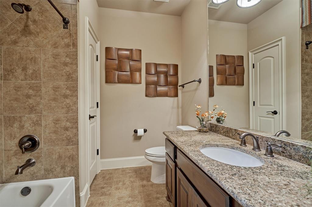 This large Bathroom is adjacent to Bedroom #5.