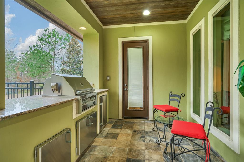 The outdoor Kitchen is conveniently located off of the downstairs Game Room and has a separate entrance into the full Pool Bath.