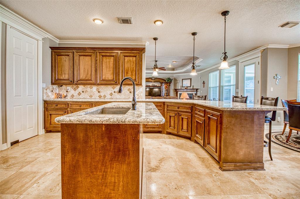 [Kitchen] Gourmet island kitchen opens to the breakfast room and easy access to the garage.