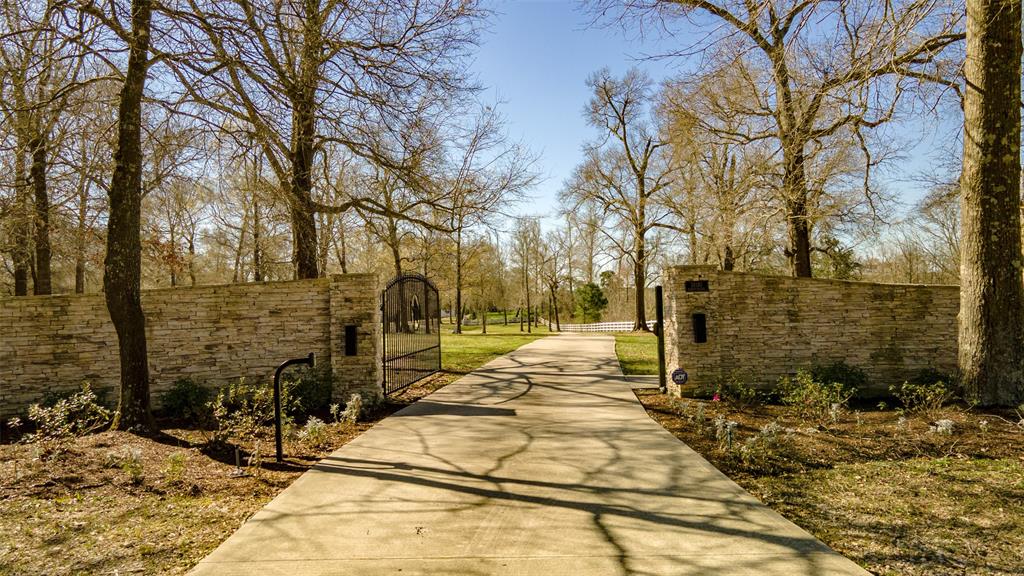 Beginning with this majestic stone entryway, this ten acre property has close to 6,000 sqft of contemporary county living space.