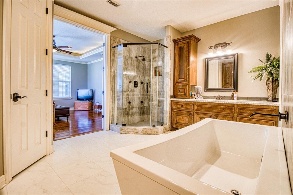 [Primary bath]  Gracious flow from bedroom to open bathroom.
