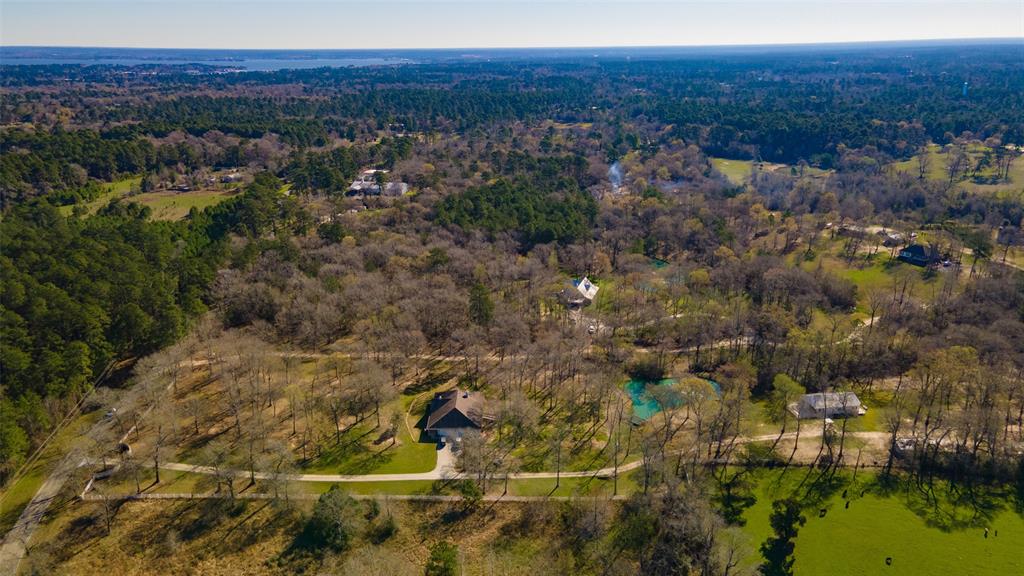 Minutes from Lake Conroe, in the highly sought after school district of Montgomery, this 10 acre property has a stocked pond, deer and game, ready for country living.