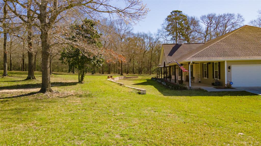 Nothing says southern charm like the multiple outdoor spaces, including covered porches and decks, surrounded by the picturesque trees and beautiful grassy fields.