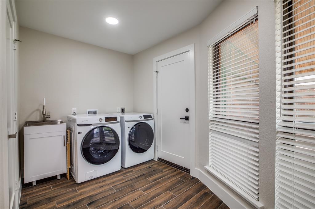 Large laundry and mud room connecting to garage