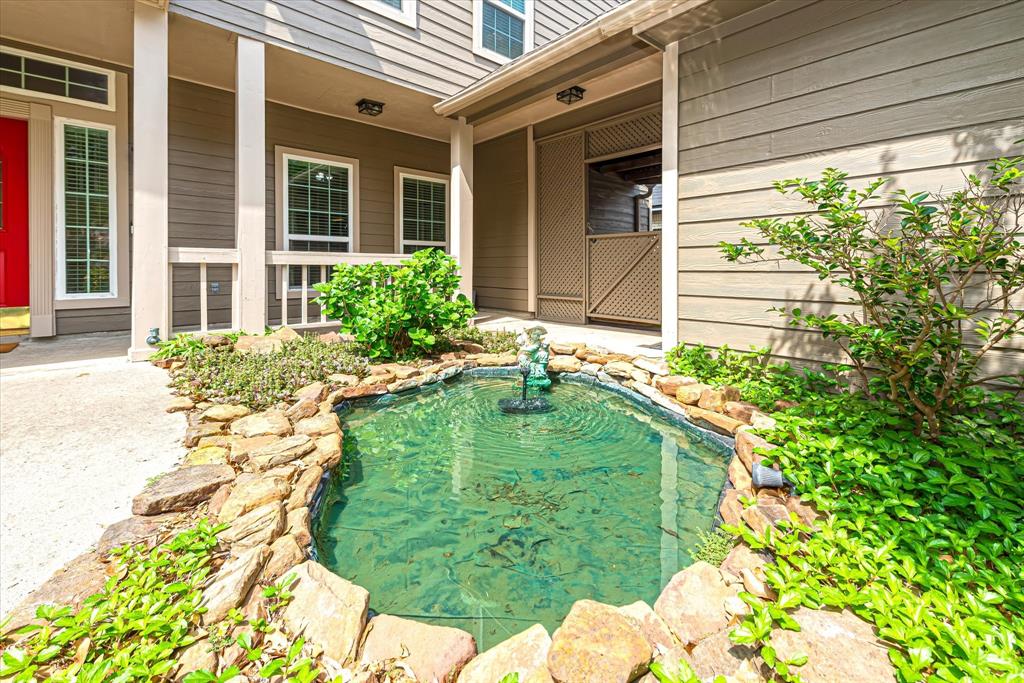 Front yard Pond Feature with accent lighting