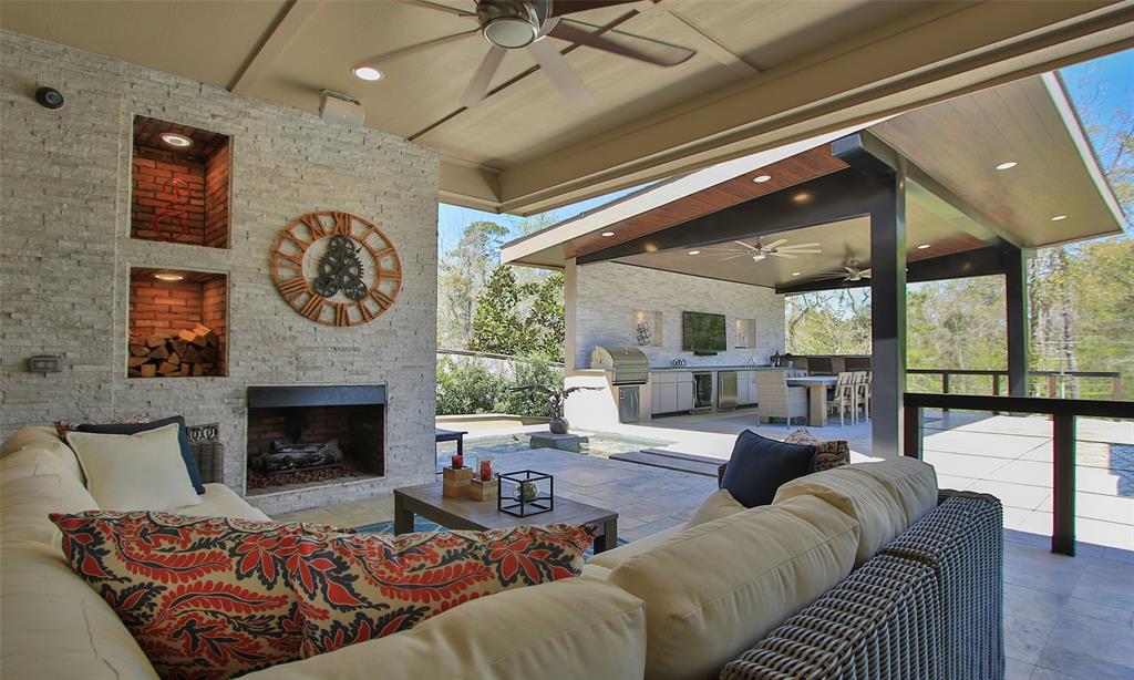 Beautiful Lounge Area Just Outside The Backdoor Features A Gas Fireplace