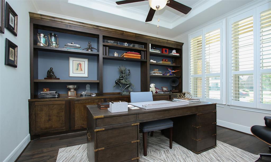 Handsome Study Off The Front Entrance Featuring A Custom Built-In