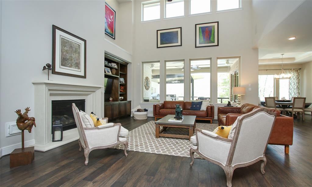 High Ceilings And Large Windows Fill The Family Room With Tons Of Natural Light!