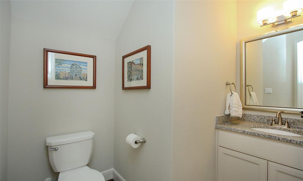 Generous Downstairs Powder Room Convenient For Family & Guests Alike