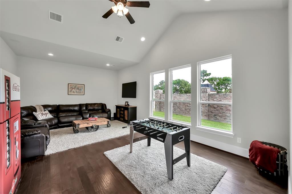 Oversized Game room is perfect for entertaining, and Superbowl parties! With an en suit bathroom leads out to back yard