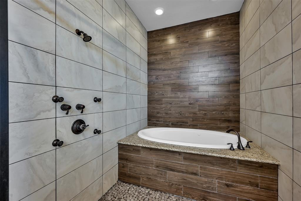 Master bath with walk in Shower two heads and separate bath
