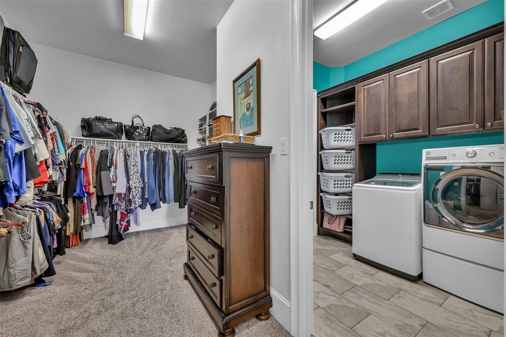 Large master closet connected to custom built Laundry room