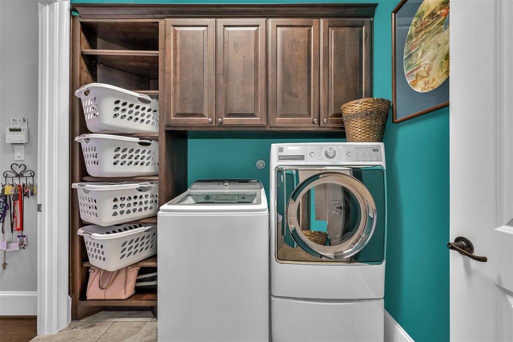 Laundry room connected to Master Closet makes laundry a breeze