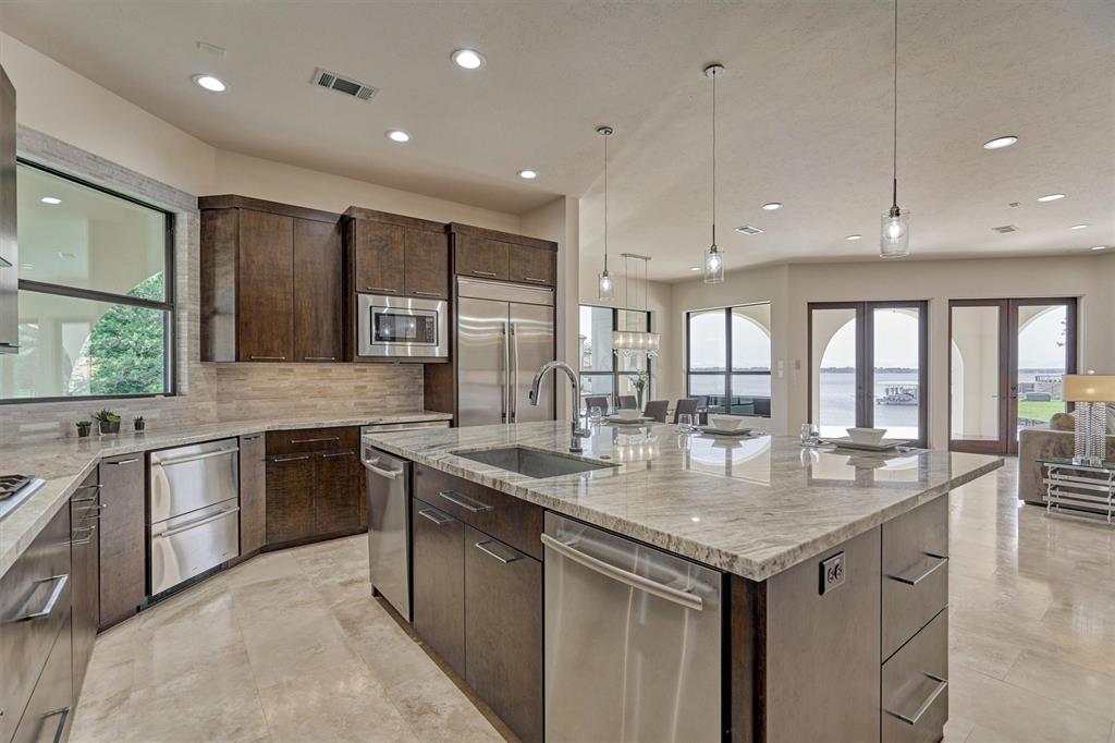 KITCHEN - Open to the main area with views of the lake from 3 sides!