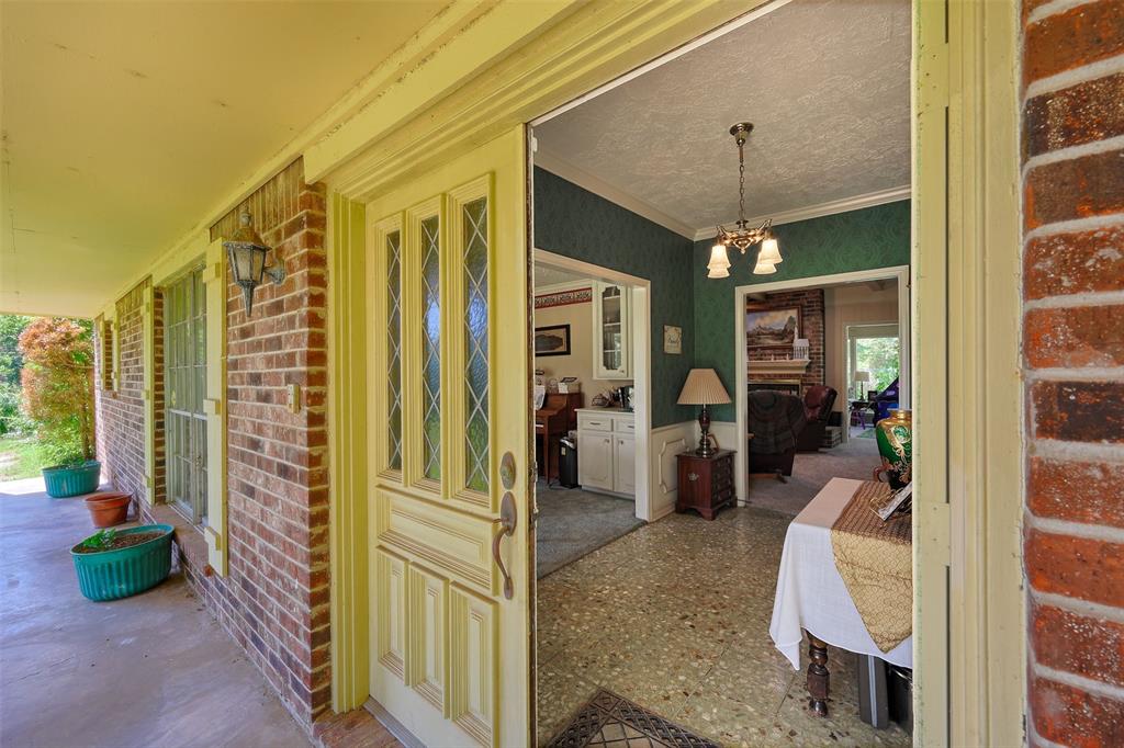 Double doors welcomes you into the elegant foyer.