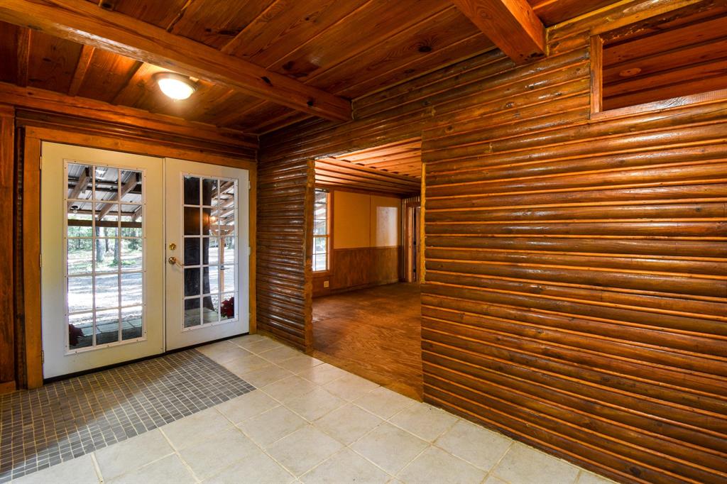 Welcome in to this unique home comprised of the charm of an old log cabin mixed with modern updates.